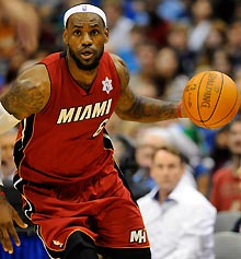 LeBron James helped the Heat to leads of as much as 35 points over the defending NBA champs.