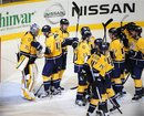 Nashville Predators goalie Pekka Rinne (35), of Finland, is congratulated by right wing Alexander Radulov (47) as the team celebrates its 3-1 win over the Winnipeg Jets in an NHL hockey game on Saturday, March 24, 2012, in Nashville, Tenn.