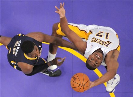 Los Angeles Lakers Center Andrew Bynum, Right, Grabs