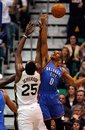 Oklahoma City Thunder guard Russell Westbrook (0) competes for a rebound against Utah Jazz center Al Jefferson (25) during the first half of their NBA basketball game in Salt Lake City, Friday, Feb. 10, 2012. The Thunder beat the Jazz 101-87.