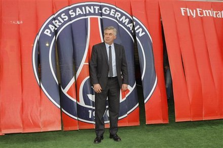 Paris Saint Germain (PSG) New Coach Carlo Ancelotti Poses