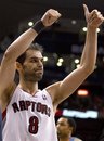 Toronto Raptors guard Jose Calderon gestures after the Raptors defeated the Charlotte Bobcats 92-87 in an NBA basketball game in Toronto on Tuesday, April 3, 2012.