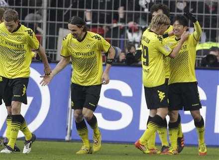 Dortmund's Shinji Kagawa Of Japan, Right, Celebrates