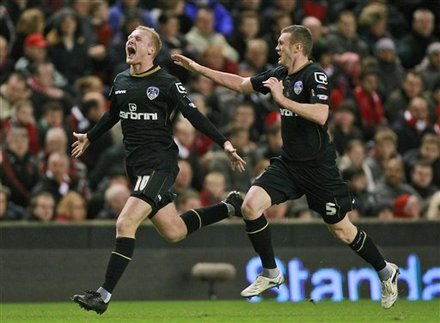 Oldham Athletic's Robbie Simpson, Left, Celebrates