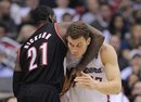 Los Angeles Clippers forward Blake Griffin , right, tangles with Portland Trail Blazers forward J.J. Hickson during the second half of their NBA basketball game, Friday, March 30, 2012, in Los Angeles. The Clippers won 98-97.