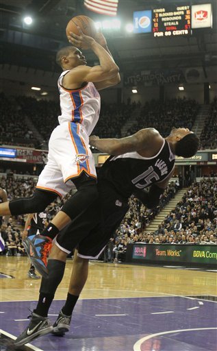 Oklahoma City Thunder Guard Russell Westbrook, Left, Was Called For A N Offensive Foul When He Crashed In Sacramento