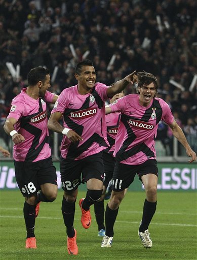 Juventus Chilean Forward Arturo Vidal, Center, Celebrates