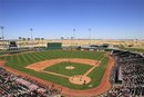 The Cincinnati Reds and the Cleveland Indians play in the seventh inning of their final spring training baseball game of the season, Monday, April 2, 2012, in Goodyear, Ariz. The Reds won 2-1.