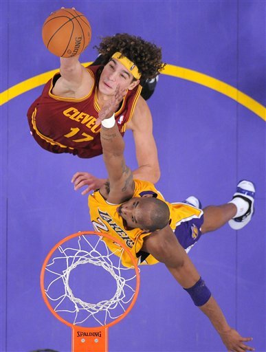 Cleveland Cavaliers Power Forward Anderson Varejao, Top, Of Brazil Puts Up A Shot As Los Angeles Lakers Shooting Guard