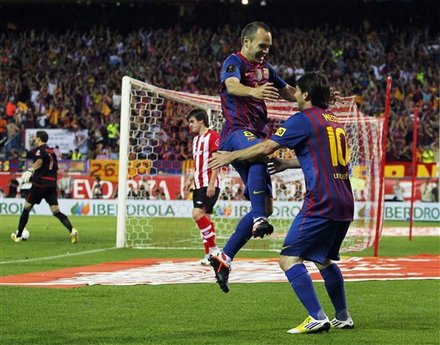 FC Barcelona's Lionel Messi From Argentina, Right,  Celebrates