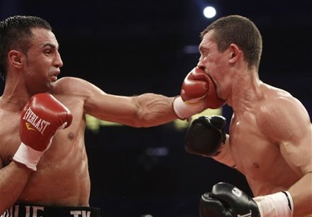 WBA World Champion Vyacheslav Senchenko, Right, Of Ukraine Receives