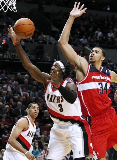Portland Trail Blazers Forward Gerald Wallace (3) Pulls In A Rebound Against Washington Wizards Center JaVale McGee As