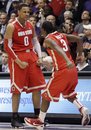 Ohio State forward Jared Sullinger (0) celebrates with guard Shannon Scott (3) after defeating Northwestern 75-73 in an NCAA college basketball game in Evanston, Ill., Wednesday, Feb. 29, 2012.