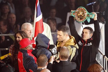 WBC Heavyweight Champion Vitali Klitschko Of Ukraine, Center Right, Is