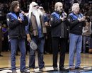 The Oak Ridge Boys, from left, Richard Sterban, William Lee Golden, Duane Allen and Joe Bonsall sing the national anthem before the start of an NBA basketball game between the Utah Jazz and Dallas Mavericks on Friday, Jan. 27, 2012, in Dallas.