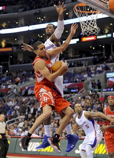 Houston Rockets Shooting Guard Kevin Martin, Front, Collides