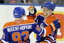 Edmonton Oilers ' Ales Hemsky , right, congratulates teammate Ryan Nugent-Hopkins on his goal against the Phoenix Coyotes during their third period NHL hockey game in Edmonton, Alberta, on Saturday, Feb. 25, 2012.