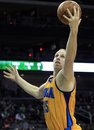 New Orleans Hornets ' Chris Kaman (35) goes up with the ball during the first half of an NBA basketball game against the New Jersey Nets in Newark, N.J., Saturday, March 17, 2012. Kaman had 20 points in the Hornets 102-94 win.