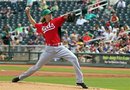 Cincinnati Reds ' Bronson Arroyo pitches against the Cleveland Indians in the first inning of a spring training baseball game Saturday, March 17, 2012, in Goodyear, Ariz.