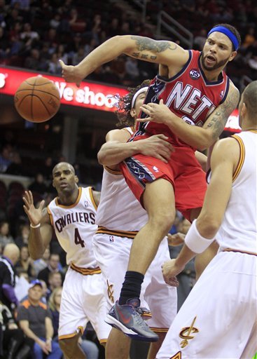New Jersey Nets Point Guard Deron Williams, Right, Is