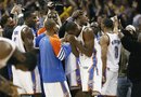 The Oklahoma City Thunder celebrates after winning an NBA basketball game against the Dallas Mavericks in Oklahoma City, Thursday, Dec. 29, 2011.  Oklahoma City won 104-102.