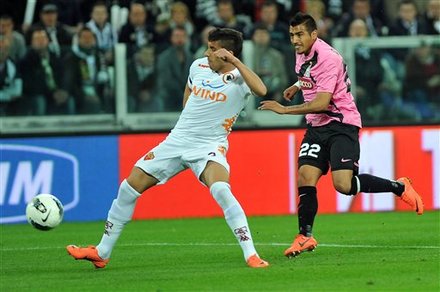 Juventus' Arturo Vidal, Of Chile,right,  Scores