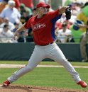 Philadelphia Phillies starting pitcher Vance Worley winds up in the third inning of the Phillies 4-1 spring training baseball victory over the Pittsburgh Pirates at McKechnie Field in Bradenton, Fla., Monday, March 12, 2012.