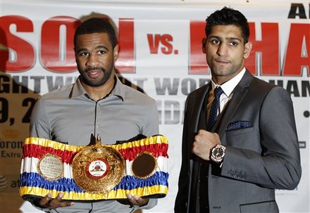 Light Welterweight World Champion US Boxer Lamont Peterson,  Left, And British Boxer Amir Khan, Pose For The