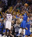 Dallas Mavericks guard Jason Terry (31) attempts a shot over Oklahoma City Thunder center Kendrick Perkins (5) in the final seconds of the fourth quarter of an NBA basketball game in Oklahoma City, Monday, March 5, 2012. Oklahoma City won 95-91.