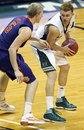 Clemson guard Tanner Smith (5) defends Hawaii guard Zane Johnson (3) in the second half of an NCAA college basketball game Sunday, Dec. 25, 2011, in Honolulu. Hawaii defeated Clemson 75-68.