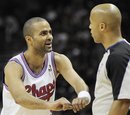 San Antonio Spurs ' Tony Parker , left, of France, talks to referee Marc Davis during the first half of an NBA basketball game against the Indiana Pacers , Saturday, March 31, 2012, in San Antonio. San Antonio won 112-103.