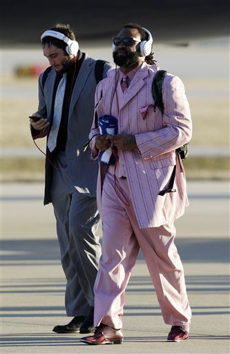 New England Patriots Brandon Spikes, Right, And Alex Silvestro Arrive At The Indianapolis International Airport For NFL
