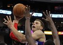 Los Angeles Clippers ' forward Blake Griffin attempts to score over Utah Jazz during a NBA basketball game in Los Angeles, Saturday, March 31, 2012. The Clippers won 105-96.