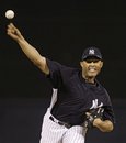 New York Yankees relief pitcher Mariano Rivera delivers a warm-up pitch before throwing in the fifth inning of a spring training baseball game against the Boston Red Sox at Steinbrenner Field in Tampa, Fla.,Tuesday, March 13, 2012.