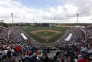 Fans watch a Atlanta Braves - New York Yankees spring training baseball game at Champions Stadium in Kissimmee, Fla., Saturday, March 10, 2012.