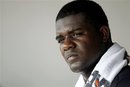 New York Yankees starting pitcher Michael Pineda watches from the dugout against the Washington Nationals during a spring training baseball game in Viera, Fla., Thursday, March 15, 2012.