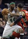 Boston Celtics forward Chris Wilcox (44)  drives to the basket against Toronto Raptors guard Jerryd Bayless (5) during the second half of their NBA basketball game in Boston, Wednesday, Feb. 1, 2012. The Celtics defeated the Raptors 100-64.