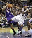 Phoenix Suns guard Shannon Brown , left, drives to the basket past Sacramento Kings guard Isaiah Thomas during the first quarter of an NBA basketball game in Sacramento, Calif., Tuesday, April 3, 2012.