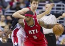 Atlanta Hawks ' Josh Smith (5) drives past Washington Wizards defender Jan Vesely , of Czech Republic, during the second half of an NBA basketball game on Saturday, March 24, 2012, in Washington.  The Hawks defeated the Wizards 95-92.