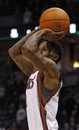 Milwaukee Bucks ' Brandon Jennings (3) puts up a shot against the Miami Heat during the second half of an NBA basketball game on Wednesday, Feb. 1, 2012, in Milwaukee. The Bucks won 105-97.