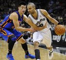 San Antonio Spurs ' Tony Parker , right, of France, drives around New York Knicks ' Jeremy Lin during the second half of an NBA basketball game on Wednesday, March 7, 2012, in San Antonio. San Antonio won 118-105.