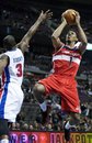 Washington Wizards ' Nick Young (1) shoots against Detroit Pistons ' Rodney Stuckey (3) in the first half of an NBA basketball game, Sunday, Feb. 12, 2012, in Auburn Hills, Mich. The Wizards won 98-77.