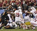 Stanford kicker Jordan Williamson (19) kicks and misses a field goal attempt in overtime during the Fiesta Bowl NCAA college football game against Oklahoma State Monday, Jan. 2, 2012, in Glendale, Ariz. Oklahoma State won 41-38 in overtime.