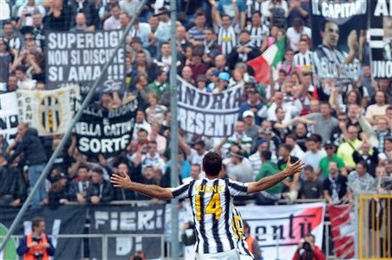 Juventus' Mirko Vucinic,of Montenegro, Celebrates