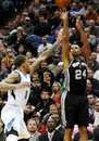 San Antonio Spurs ' Richard Jefferson , right, shoots as Minnesota Timberwolves ' Michael Beasley defends  in the second half of an NBA basketball game, Monday, Jan. 2, 2012, in Minneapolis. The Wild won 106-96. Jefferson scored 16 points for the Spurs and Beasley had 19 points.