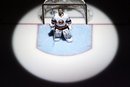 New York Islanders goalie Evgeni Nabokov stands during the national anthem before the Islanders' NHL hockey game against the Pittsburgh Penguins in Pittsburgh Tuesday, March 27, 2012. Nabokov left the game in the third period. The Islanders won 5-3.