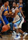 Memphis Grizzlies guard Gilbert Arenas , right, defends Golden State Warriors forward Brandon Rush in the first half of an NBA basketball game Tuesday, April 3, 2012, in Memphis, Tenn. The Grizzlies defeated the Warriors 98-94.