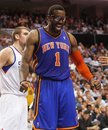 New York Knicks forward Amare Stoudemire celebrates after getting fouled while making a layup against the Philadelphia 76ers during an NBA basketball game Wednesday, March 21, 2012, in Philadelphia. The Knicks won 82-79. (AP Photo/The News-Journal, Daniel Sato) NO SALES