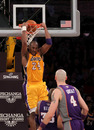 LOS ANGELES, CA - JANUARY 10:  Kobe Bryant #24 of the Los Angeles Lakers reverse dunks over Grant Hill #33 and Marcin Gortat #4 of the Phoenix Suns at Staples Center on January 10, 2012 in Los Angeles, California. The Lakers won 99-83. (Photo by Stephen Dunn/Getty Images)
