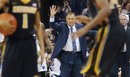 Old Dominion head coach Blaine Taylor calls out to his team during an NCAA college basketball game against Missouri , Friday, Dec. 30, 2011, in Norfolk, Va.